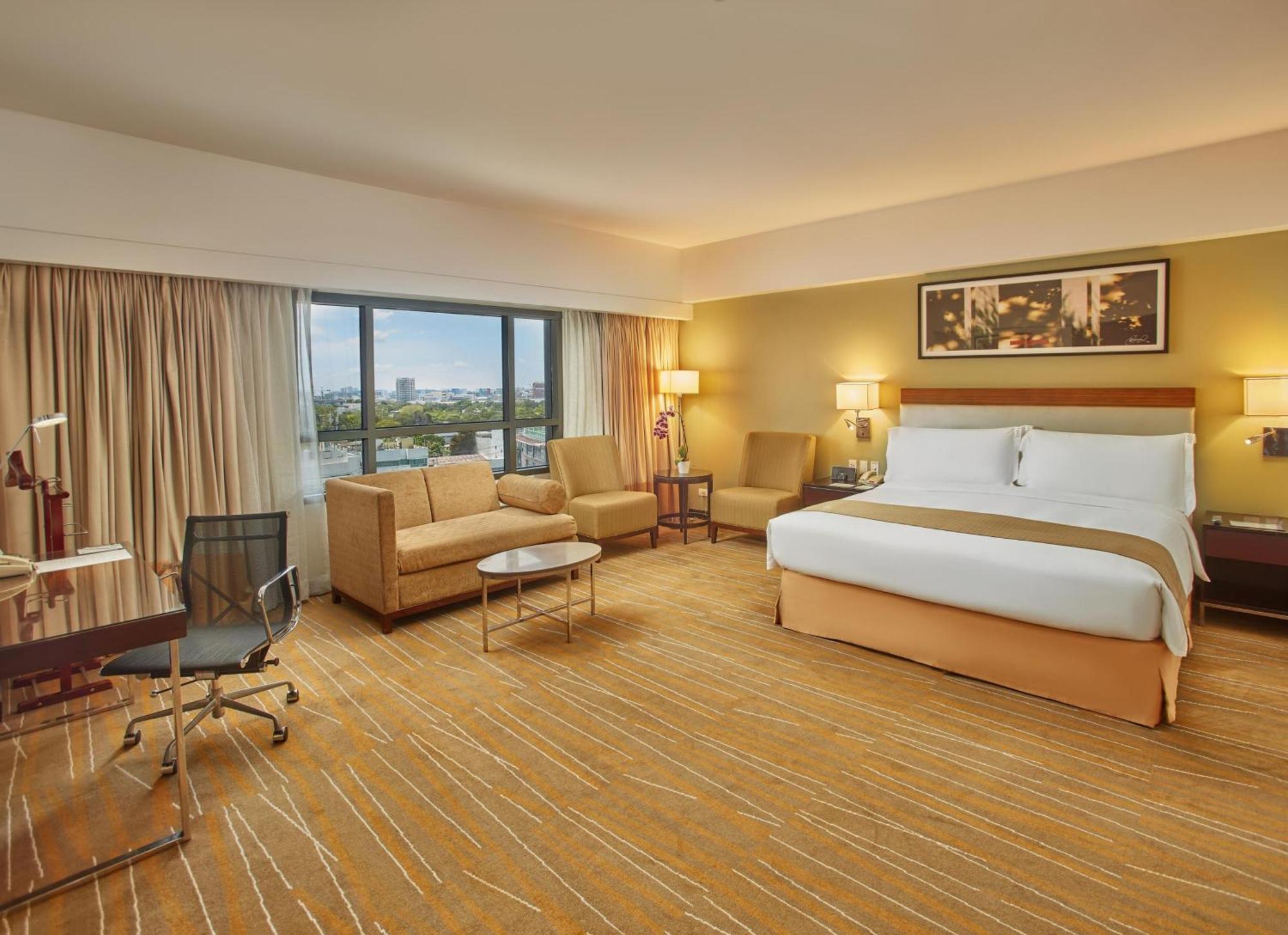Holiday Inn & Suites Makati By Ihg Makati City Kültér fotó Deluxe Room